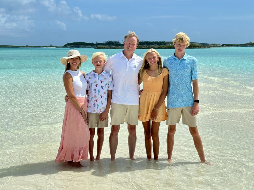 Family with teen children beach photo