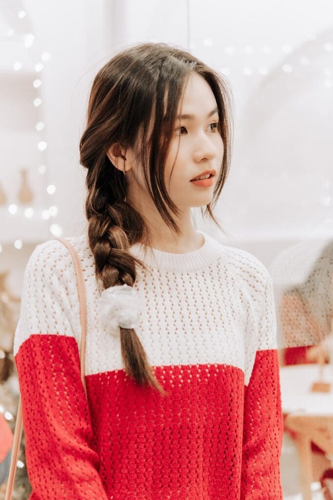 Beautiful young woman with loose side braid