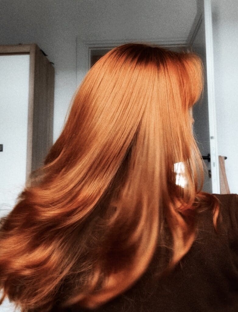 back of a redhead woman's head