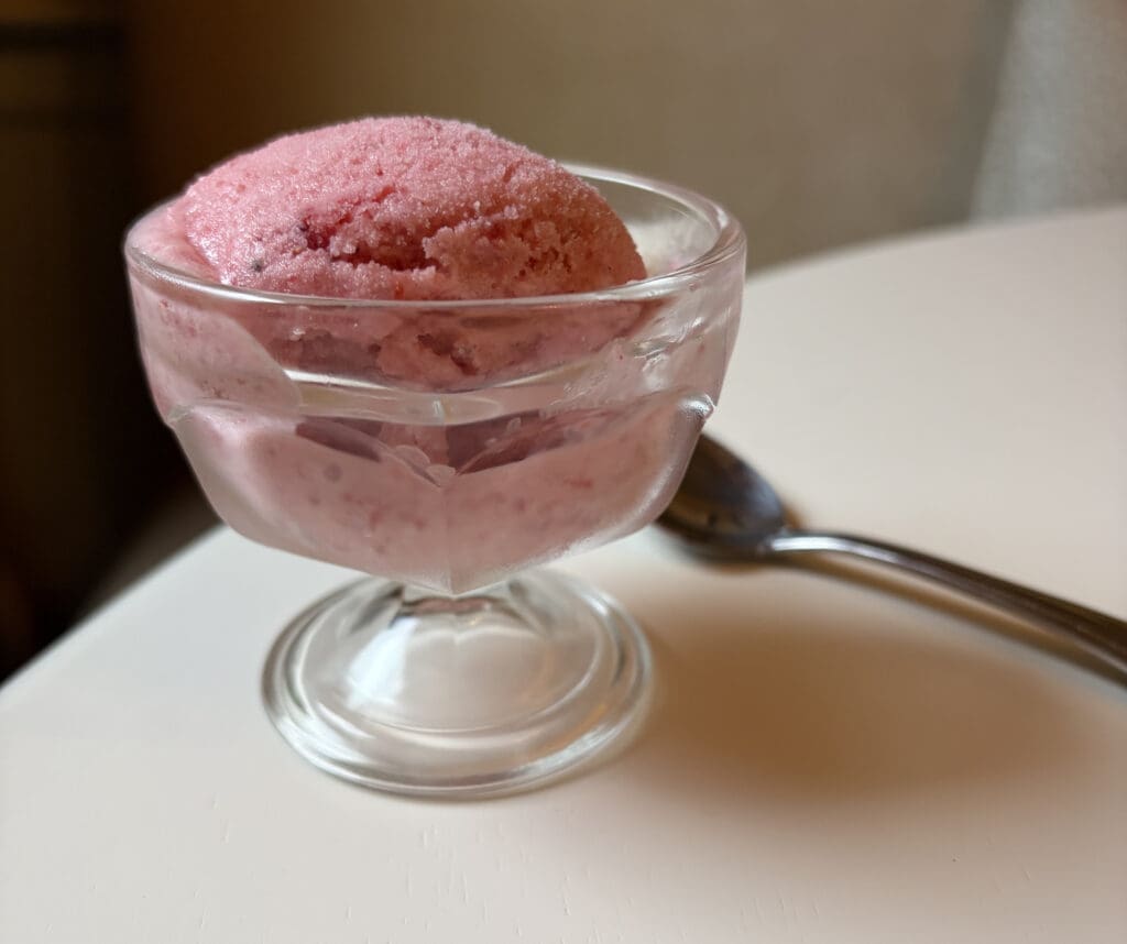 Small bowl of homemade strawberry ice cream