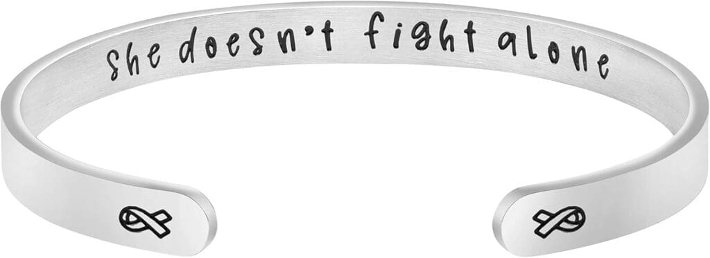 "She Doesn't Fight Alone" inscribed bracelet example of personalized jewelry